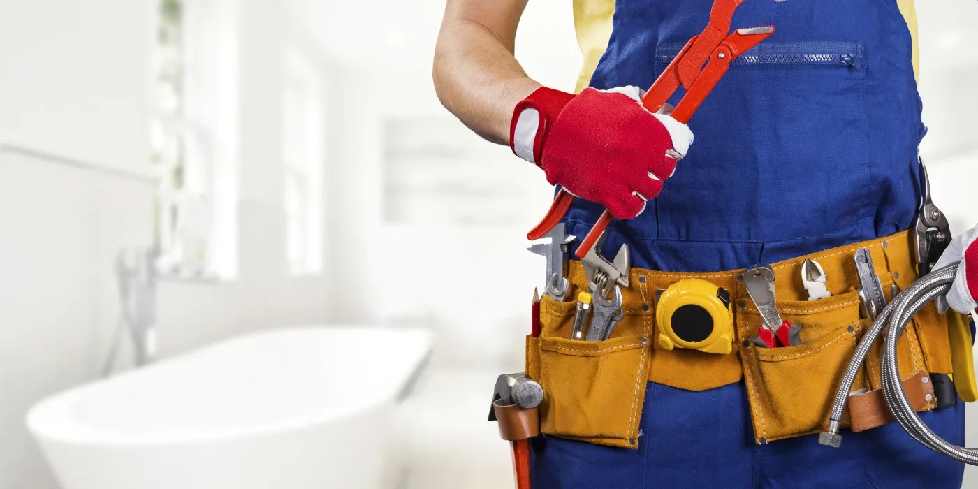 The torso of plumbing technician showing a tool belt from The Cedar Park Plumber in Liberty Hill, TX - Liberty Hill TX